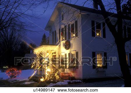 Stockbridge, Berkshires, Massachusetts, Christmas starlights and candles in the windows decorate the beautiful Four Seasons Bed & Breakfast at night in Stockbridge in the state of Massachusetts. View Large Photo Image Stock Photo - Stockbridge, Berkshires, Massachusetts, Christmas starlights and candles in the windows decorate the beautiful Four Seasons Bed & Breakfast at night in Stockbridge in the state of Massachusetts.. Fotosearch