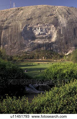 Stone Mountain, Atlanta, Stone Mountain Park, Georgia, Scenic view of The Confederate Memorial Carving on Stone Mountain, the massive dome of granite rock, from the green lawn in the spring in Georgia's Stone Mt. Park near Atlanta in the state of Georgia View Large Photo Image Stock Image - Stone Mountain, Atlanta, Stone Mountain Park, Georgia, Scenic view of The Confederate Memorial Carving on Stone Mountain, the massive dome of granite rock, from the green lawn in the spring in Georgia's Stone Mt. Park near Atlanta in the state of Georgia. Fotosearch