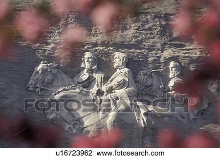 Stone Mountain, Atlanta, Stone Mountain Park, Georgia, carving, The Confederate Memorial Carving of President Jefferson Davis, General Thomas Stonewall Jackson and Robert E. Lee on Stone Mountain through Dogwood blossoms in the spring in Georgia's Stone View Large Photo Image Stock Image - Stone Mountain, Atlanta, Stone Mountain Park, Georgia, carving, The Confederate Memorial Carving of President Jefferson Davis, General Thomas Stonewall Jackson and Robert E. Lee on Stone Mountain through Dogwood blossoms in the spring in Georgia's Stone . Fotosearch