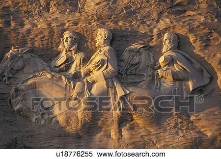 Stock Photography -  Stone Mountain, carving, Georgia's Stone Mountain Park, Atlanta, Georgia, The Confederate Memorial Carving of President Jefferson Davis, General Thomas Stonewall Jackson and General Robert E. Lee on Stone Mountain in Georgia's Stone Mt. Park near Atlanta. Fotosearch