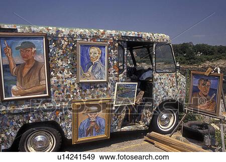 street artist, Perkins Cove, Ogunquit, Maine, Atlantic Ocean, Paintings for sale hang from an artist's van outside the scenic fishing village of Perkins Cove in Ogunquit in the state of Maine. View Large Photo Image Stock Photo - street artist, Perkins Cove, Ogunquit, Maine, Atlantic Ocean, Paintings for sale hang from an artist's van outside the scenic fishing village of Perkins Cove in Ogunquit in the state of Maine.. Fotosearch