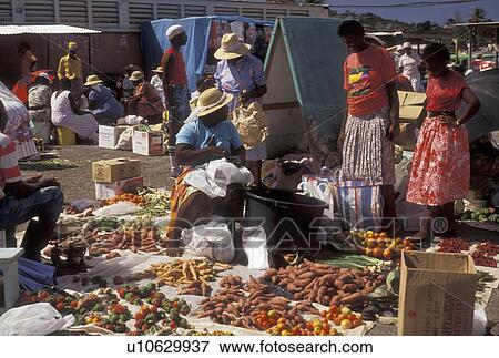 Stock Photo -  street market, Antigua, Caribbean, St. John's, Caribbean Islands, Local people shopping at on Market Day at an open air market in St. John's the capital of the island of Antigua (a British Commonwealth member). . Fotosearch