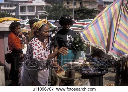 street market, Guadeloupe, Caribbean, Caribbean Islands, Local woman weighing fish for sale at open air market on Market Day in Pointe-a-Pitre on the island of Grand Terre in Guadeloupe (a french department) The Emerald Isle. View Large Photo Image Stock Photo - street market, Guadeloupe, Caribbean, Caribbean Islands, Local woman weighing fish for sale at open air market on Market Day in Pointe-a-Pitre on the island of Grand Terre in Guadeloupe (a french department) The Emerald Isle.. Fotosearch