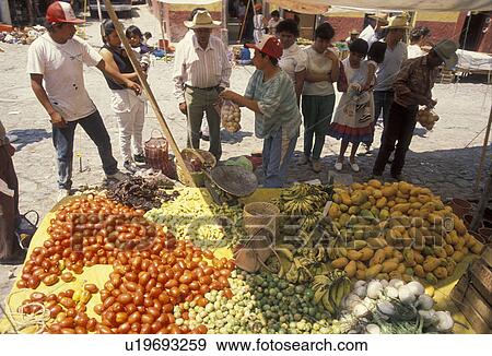 street market, Mexico, San Miguel de Allende, Local people gather at a street market selling fresh produce in San Miguel de Allende in the state of Guanajuato. View Large Photo Image Stock Photo - street market, Mexico, San Miguel de Allende, Local people gather at a street market selling fresh produce in San Miguel de Allende in the state of Guanajuato.. Fotosearch