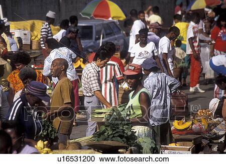 Stock Image -  street market, Trinidad, Trinidad and Tobago, Caribbean, Port of Spain, Caribbean Islands, Local people selling produce on Market Day in the city of Port of Spain the capital city on the island of Trinidad (a British Commonwealth member).. Fotosearch