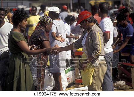 street market, Trinidad, Trinidad and Tobago, Caribbean, Port of Spain, Caribbean Islands, Local people selling their goods on Market Day in the city of Port of Spain the capital city on the island of Trinidad (a British Commonwealth member). View Large Photo Image Stock Photography - street market, Trinidad, Trinidad and Tobago, Caribbean, Port of Spain, Caribbean Islands, Local people selling their goods on Market Day in the city of Port of Spain the capital city on the island of Trinidad (a British Commonwealth member).. Fotosearch