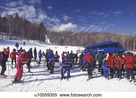Stock Photography -  Sugarbush, Vermont, Warren, Mad River Valley, VT, Skiers waiting in line at ski lift at Sugarbush Ski Resort in winter.. Fotosearch