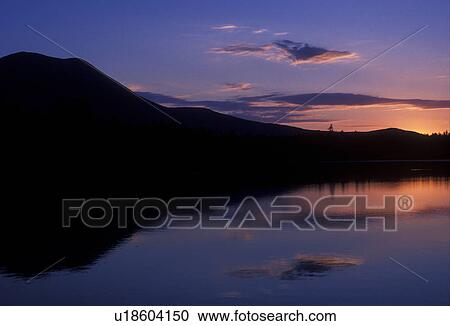 sunrise, sunset, lake, Maine, Baxter State Park, Scenic sunrise with the reflection of Mt. Katahdin in the calm waters of Daicey Pond in Baxter State Park. View Large Photo Image Stock Image - sunrise, sunset, lake, Maine, Baxter State Park, Scenic sunrise with the reflection of Mt. Katahdin in the calm waters of Daicey Pond in Baxter State Park. . Fotosearch