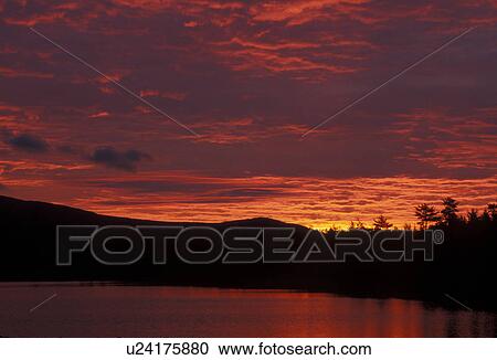 Stock Image -  sunrise, sunset, mountain, lake, Baxter State Park, Maine, [Sunrise, sunset] over Daicey Pond at Baxter State Park.. Fotosearch