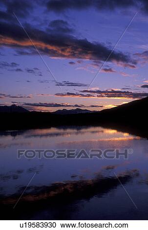 sunrise, sunset, Patagonia, Tierra del Fuego, Argentina, Andes, Ushuaia, Sunset over the world's southernmost town of Ushuaia in Argentina. View Large Photo Image Stock Image - sunrise, sunset, Patagonia, Tierra del Fuego, Argentina, Andes, Ushuaia, Sunset over the world's southernmost town of Ushuaia in Argentina. . Fotosearch