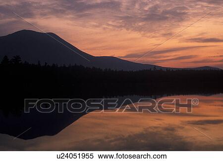 sunset, sunrise, lake, Maine, Baxter State Park, Scenic sunset with the reflection of Mt. Katahdin in the calm waters of Daicey Pond in Baxter State Park. View Large Photo Image Stock Photography - sunset, sunrise, lake, Maine, Baxter State Park, Scenic sunset with the reflection of Mt. Katahdin in the calm waters of Daicey Pond in Baxter State Park. . Fotosearch