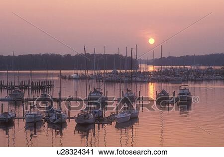 sunset, sunrise, marina, Maryland, Georgetown, Sunset over the marina on Sassatras River in Chesapeake Bay in Georgetown in Maryland. View Large Photo Image Stock Image - sunset, sunrise, marina, Maryland, Georgetown, Sunset over the marina on Sassatras River in Chesapeake Bay in Georgetown in Maryland.. Fotosearch