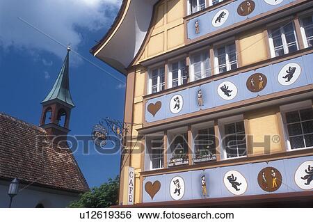 Switzerland, Appenzell, Europe, A chapel and a beautiful building constructed of wood and adorned with brightly painted designs in downtown Appenzell in the Canton of Appenzell. View Large Photo Image Stock Photograph - Switzerland, Appenzell, Europe, A chapel and a beautiful building constructed of wood and adorned with brightly painted designs in downtown Appenzell in the Canton of Appenzell. . Fotosearch