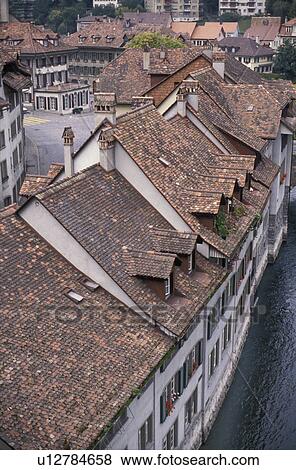 Switzerland, Bern, Europe, Aerial view of the roof tops of houses along the Aar River in the capital city of Bern in the Canton of Bern. View Large Photo Image Stock Photo - Switzerland, Bern, Europe, Aerial view of the roof tops of houses along the Aar River in the capital city of Bern in the Canton of Bern.. Fotosearch