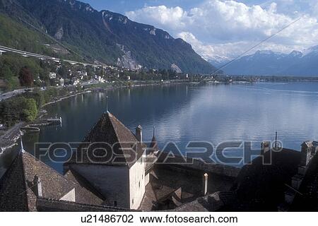 Switzerland, Chillon, Montreux, Lake Geneva, Vaud, Lac Leman, Europe, Scenic view of the waterfront along Lake Geneva and the beautiful Alps from the Chateau de Chillon a 13th century fortress in the Canton of Vaud. View Large Photo Image Stock Image - Switzerland, Chillon, Montreux, Lake Geneva, Vaud, Lac Leman, Europe, Scenic view of the waterfront along Lake Geneva and the beautiful Alps from the Chateau de Chillon a 13th century fortress in the Canton of Vaud. . Fotosearch