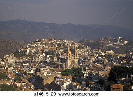 Taxco, Mexico, Aerial view of the old mining town of Taxco Silver City in the state of Guerrero. Taxco is the oldest mining town in North America View Large Photo Image Stock Photo - Taxco, Mexico, Aerial view of the old mining town of Taxco Silver City in the state of Guerrero. Taxco is the oldest mining town in North America . Fotosearch