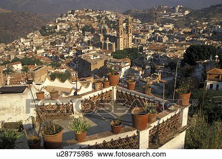 Taxco, Mexico, Aerial view of the old mining town of Taxco Silver City in the state of Guerrero. Taxco is the oldest mining town in North America View Large Photo Image Stock Photography - Taxco, Mexico, Aerial view of the old mining town of Taxco Silver City in the state of Guerrero. Taxco is the oldest mining town in North America . Fotosearch