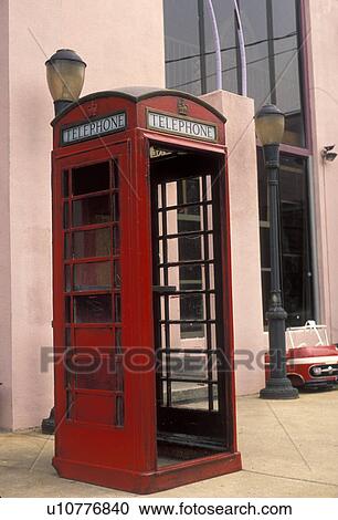 Stock Image -  telephone booth, Georgia, A red antique phone booth outside an antique shop in Chamblee . Fotosearch