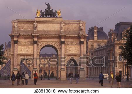 The Louvre, Paris, France, Europe, Jardins des Tuileries, Mini Arc de Triomphe at the Jardins des Tuileries with he Musee du Louvre (Louvre Museum) in the background in Paris. View Large Photo Image Stock Photo - The Louvre, Paris, France, Europe, Jardins des Tuileries, Mini Arc de Triomphe at the Jardins des Tuileries with he Musee du Louvre (Louvre Museum) in the background in Paris. . Fotosearch