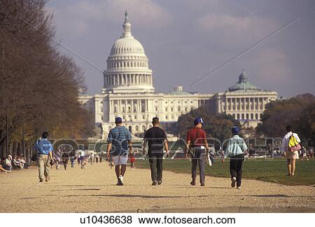 The Mall, U. S. Capitol, Washington, District of Columbia, D. C People walk on the Mall with the U. S. Capitol Building in the background in the nations capital Washington, DC. View Large Photo Image Stock Photo - The Mall, U. S. Capitol, Washington, District of Columbia, D. C People walk on the Mall with the U. S. Capitol Building in the background in the nations capital Washington, DC.. Fotosearch