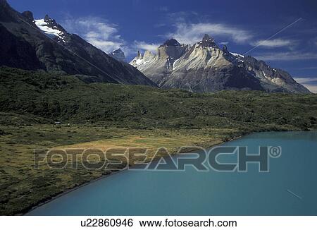 Torres Del Paine National Park, Patagonia, Chile, Andes, Scenic view of Lago (lake) Pehoe and huge granite pillars of mountains in Parque Nacional Torres Del Paine (National Park) in Chile. View Large Photo Image Stock Photograph - Torres Del Paine National Park, Patagonia, Chile, Andes, Scenic view of Lago (lake) Pehoe and huge granite pillars of mountains in Parque Nacional Torres Del Paine (National Park) in Chile.. Fotosearch