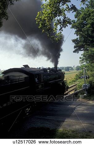 train, locomotive, engine, Lancaster County, Pennsylvania, excursion train, Strasburg Rail Road Company, Steam locomotive pulls the passenger train through the Amish Country in Strasburg in Pennsylvania Dutch Country in the state of Pennsylvania. View Large Photo Image Stock Photograph - train, locomotive, engine, Lancaster County, Pennsylvania, excursion train, Strasburg Rail Road Company, Steam locomotive pulls the passenger train through the Amish Country in Strasburg in Pennsylvania Dutch Country in the state of Pennsylvania. . Fotosearch