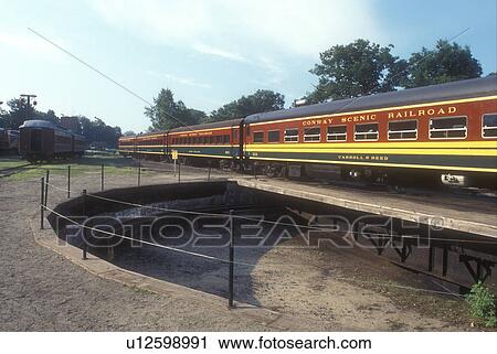 train, New Hampshire, Passenger train displayed at Conway Scenic Railroad Station built in 1874 & Museum in North Conway above a turntable, New Hampshire. View Large Photo Image Stock Image - train, New Hampshire, Passenger train displayed at Conway Scenic Railroad Station built in 1874 & Museum in North Conway above a turntable, New Hampshire. . Fotosearch