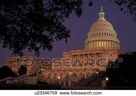 Stock Photo -  U. S. Capitol, Washington, DC, District of Columbia, capital, capitol, The United States Capitol Building is illuminated at night in Washington, D. C (Congress, The House of Representatives and the Senate meet here) . Fotosearch
