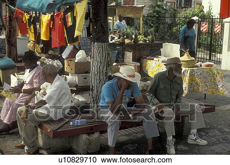 U. S. Virgin Islands, St. Thomas, Caribbean, USVI, U. S. V. I Virgin Islands, Elderly people sitting under trees at a park in Charlotte Amalie on Saint Thomas Island, US Virgin Islands. View Large Photo Image Stock Image - U. S. Virgin Islands, St. Thomas, Caribbean, USVI, U. S. V. I Virgin Islands, Elderly people sitting under trees at a park in Charlotte Amalie on Saint Thomas Island, US Virgin Islands. . Fotosearch