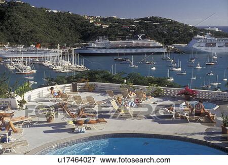 Stock Photo -  U. S. Virgin Islands, St. Thomas, Caribbean, USVI, U. S. V. I cruise, pool, Virgin Islands, Scenic view of cruise ships in the harbor from the deck of a swimming pool at Bluebeard's Castle in Charlotte Amalie the territorial capital of the US Virgin Islands . Fotosearch