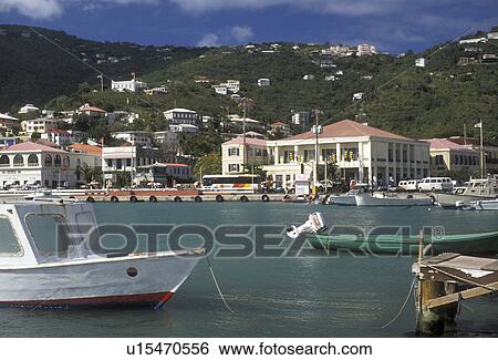 Stock Photograph -  U. S. Virgin Islands, St. Thomas, Caribbean, U. S. V. I USVI, Virgin Islands, Boats buoyed in the harbor in Charlotte Amalie the territorial capital of the US Virgin Islands on Saint Thomas Island. . Fotosearch