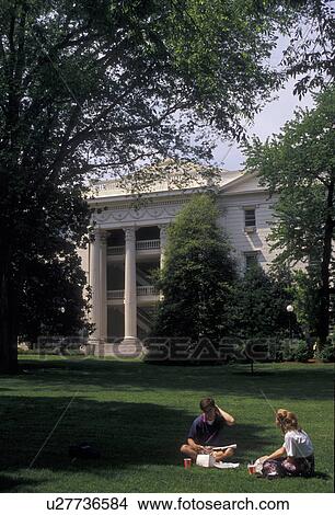 university, Athens, Georgia, A couple sits on the lawn taking a lunch break in front of the Academic Building at the University of Georgia in Athens in the state of Georgia. View Large Photo Image Picture - university, Athens, Georgia, A couple sits on the lawn taking a lunch break in front of the Academic Building at the University of Georgia in Athens in the state of Georgia.. Fotosearch