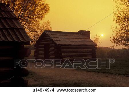 Picture -  Valley Forge Park, encampment, soldiers' hut, Valley Forge National Historical Park, Pennsylvania, Soldiers' quarters at Valley Forge Nat'l Historical Park at sunset in the state of Pennsylvania. . Fotosearch