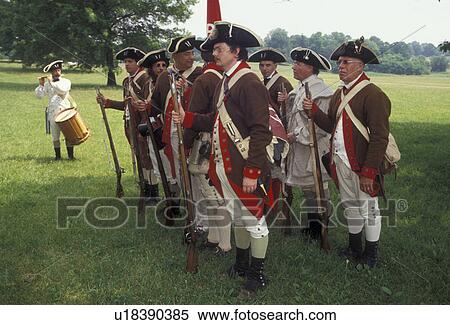 Stock Photography -  Valley Forge Park, reenactment, infantry, soldiers, Valley Forge, Pennsylvania, A group of men dressed in Continental Army soldier costumes stand with muskets in formation at the March out of the Continental Army an American Revolution reenactment in Val. Fotosearch