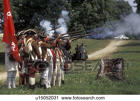 Valley Forge Park, reenactment, Valley Forge, Pennsylvania, Men dressed in Continental Army soldier costumes shoot their muskets at the reenactment of the American Revolution at the March out of the Continental Army in Valley Forge National Historical Pa View Large Photo Image Stock Image - Valley Forge Park, reenactment, Valley Forge, Pennsylvania, Men dressed in Continental Army soldier costumes shoot their muskets at the reenactment of the American Revolution at the March out of the Continental Army in Valley Forge National Historical Pa. Fotosearch