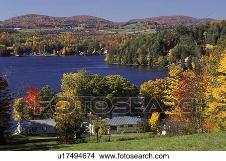 Picture -  Vermont, A scenic view of Harveys Lake and the countryside in the fall in Barnet.. Fotosearch