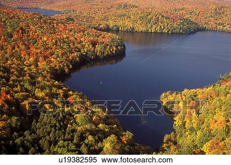 Vermont, A spectacular view of Nichols Pond in the fall from Nichols Ledge in Woodbury. View Large Photo Image Stock Photography - Vermont, A spectacular view of Nichols Pond in the fall from Nichols Ledge in Woodbury.. Fotosearch