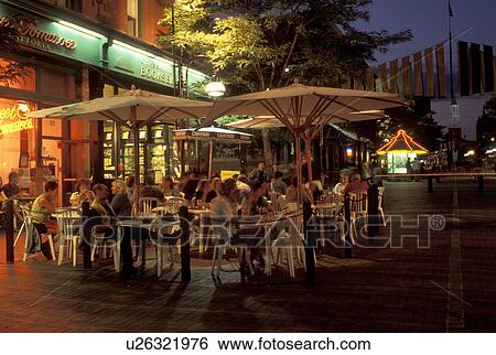 Stock Photograph -  Vermont, Burlington, Chruch Street, Market Place, An outdoor cafe on Church Street, a pedestrian street, in the evening in downtown Burlington.. Fotosearch