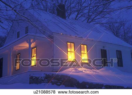 Vermont, Christmas, house, home, winter, Yellow Christmas candles glow in the windows of a country home on a snow covered winter evening in Peacham in Caledonia County in the state of Vermont. View Large Photo Image Stock Photo - Vermont, Christmas, house, home, winter, Yellow Christmas candles glow in the windows of a country home on a snow covered winter evening in Peacham in Caledonia County in the state of Vermont. . Fotosearch