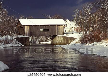 Vermont, covered bridge, Mad River Valley, Warren Covered Bridge, circa 1880, crosses over the Mad River in winter. View Large Photo Image Picture - Vermont, covered bridge, Mad River Valley, Warren Covered Bridge, circa 1880, crosses over the Mad River in winter. . Fotosearch