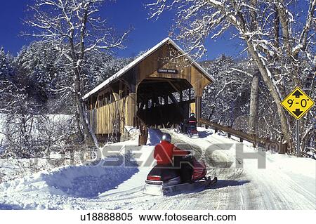 Vermont, covered bridge, snowmobile, Snowmobiling on a snow covered country road towards the Coburn Covered Bridge, circa 1851 in East Montpelier. View Large Photo Image Stock Photography - Vermont, covered bridge, snowmobile, Snowmobiling on a snow covered country road towards the Coburn Covered Bridge, circa 1851 in East Montpelier.. Fotosearch