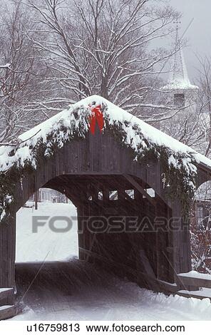Vermont, covered bridge, The snow covered Village or Church Street Covered Bridge, circa 1877, is decorated for the Christmas holidays with greens and a red bow. A New England style church stands in the background in Waterville. View Large Photo Image Stock Image - Vermont, covered bridge, The snow covered Village or Church Street Covered Bridge, circa 1877, is decorated for the Christmas holidays with greens and a red bow. A New England style church stands in the background in Waterville.. Fotosearch