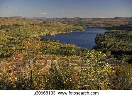 Vermont, Groton State Forest, Scenic view of Groton Lake during the fall from Owl's Head Overlook in Groton State Forest View Large Photo Image Stock Image - Vermont, Groton State Forest, Scenic view of Groton Lake during the fall from Owl's Head Overlook in Groton State Forest . Fotosearch