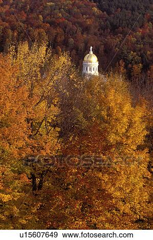 Stock Photo -  Vermont, Montpelier, Scenic view of the golden dome of the State House in Montpelier in the fall . Fotosearch