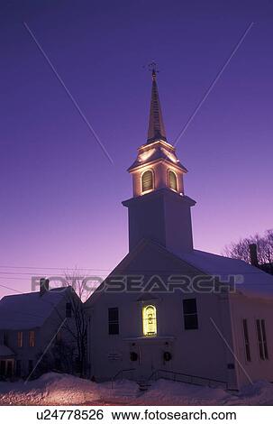 Vermont, VT, The church steeple in the scenic village of East Corinth illuminated at night in the winter View Large Photo Image Stock Photograph - Vermont, VT, The church steeple in the scenic village of East Corinth illuminated at night in the winter . Fotosearch