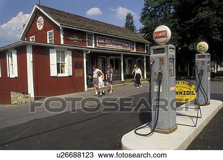 Stock Image -  Vintage gas pump, Lancaster County, Pennsylvania, Amish country, Pennsylvania Dutch Country, The Old Village Store in Bird-in-the-Hand in the state of Pennsylvania. . Fotosearch