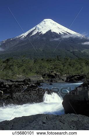 volcano, Chile, Mt. Osorno, Andes, Scenic view of the snow capped Osorno Volcano from Petrohue Falls in the South-Central Region (the Land of Lakes and Volcanoes) in Chile. View Large Photo Image Stock Image - volcano, Chile, Mt. Osorno, Andes, Scenic view of the snow capped Osorno Volcano from Petrohue Falls in the South-Central Region (the Land of Lakes and Volcanoes) in Chile. . Fotosearch