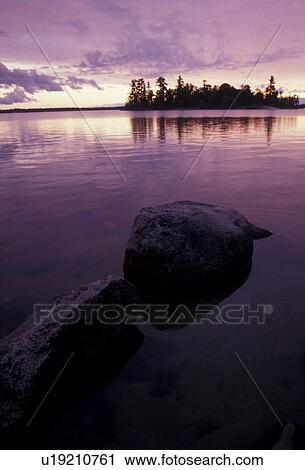 Voyageurs National Park, sunset, sunrise, lake, Minnesota, Sunset over the calm waters of Kabetogama Lake at Voyagers National Park in the state of Minnesota. View Large Photo Image Stock Image - Voyageurs National Park, sunset, sunrise, lake, Minnesota, Sunset over the calm waters of Kabetogama Lake at Voyagers National Park in the state of Minnesota.. Fotosearch