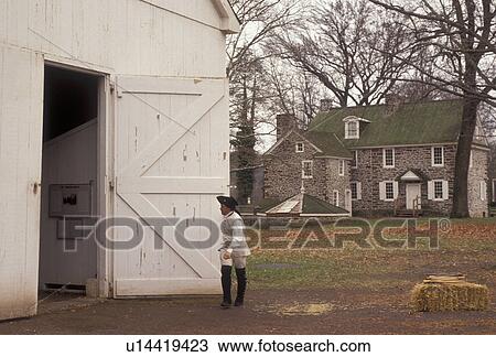 Washington Crossing, Pennsylvania, Interpreter closes door to the Boat House at Washington Crossing Historic Park in the state of Pennsylvania View Large Photo Image Stock Image - Washington Crossing, Pennsylvania, Interpreter closes door to the Boat House at Washington Crossing Historic Park in the state of Pennsylvania . Fotosearch