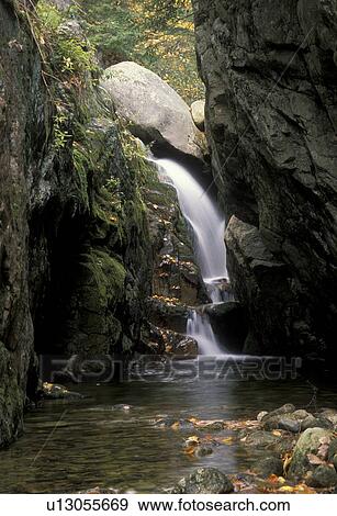 waterfall, river, Maine, A waterfall cascades down the huge boulders in White Mountain National Forest. View Large Photo Image Stock Photo - waterfall, river, Maine, A waterfall cascades down the huge boulders in White Mountain National Forest.. Fotosearch